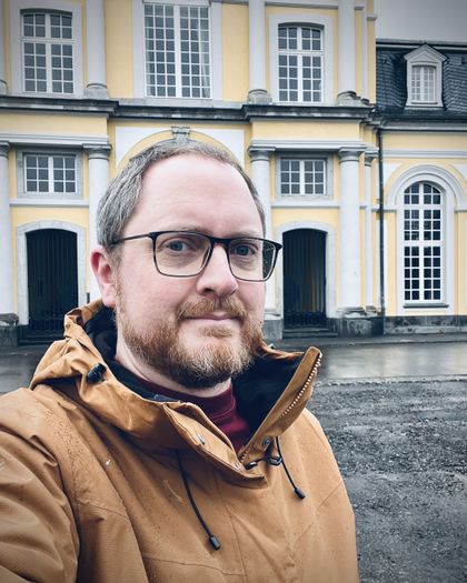 Smiling Martin looking into the camera.